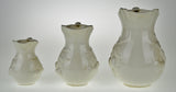Early White Porcelain Pitchers with Relief Cherry Drop Design - Set of 3